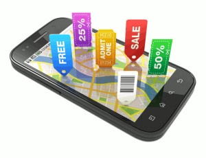 Map on mobile phone screen with icons pointing to businesses