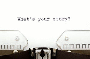 Typewriter with page inserted reading what's your story