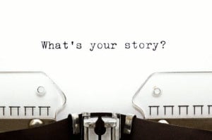 Typewriter with a page reading 'what's your story'